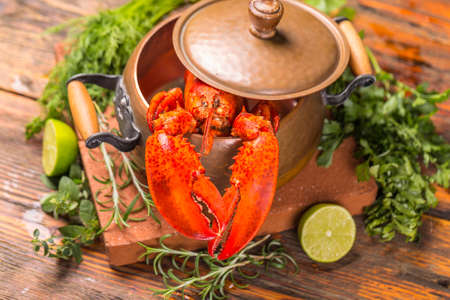 Boiled lobster in copper potの写真素材