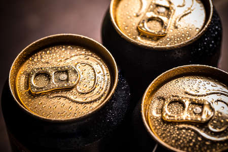 Top part of beer cans with water dropsの写真素材