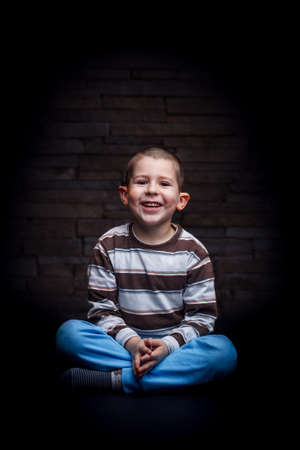 Photo of adorable young happy boy looking at camera.の写真素材