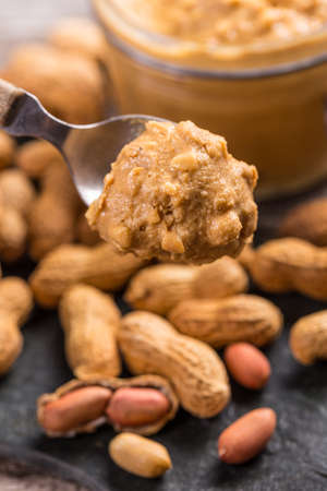 Close up of peanut cream in spoon