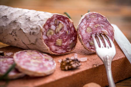 Close up of french salami with walnuts
