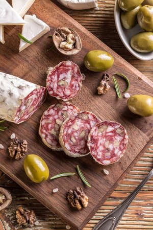 Top view of sliced salami sausageの写真素材