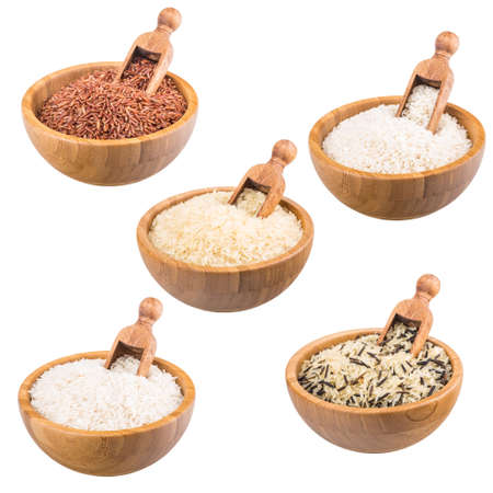 Variety of rice in bowls isolated on whiteの写真素材