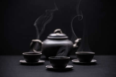 Chinese black teapot and teacups