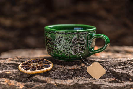 Green tea cup and teabagの写真素材