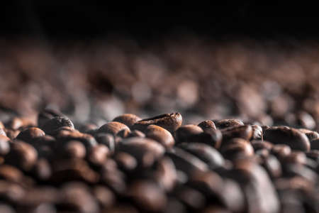A shallow depth-of-field image of coffee beansの写真素材
