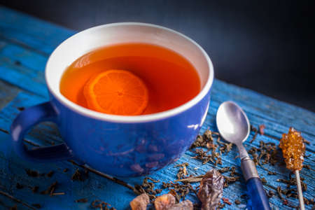 Cup of black tea with lemon