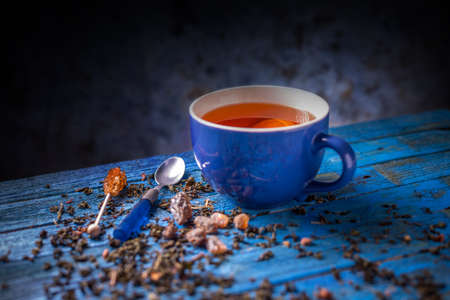 Tea composition on a blue wooden backgroundの写真素材