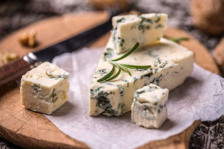 Slice of French Roquefort cheese with walnutsの写真素材