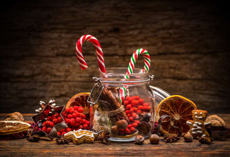 Sweet striped candy canes in glass jarの写真素材