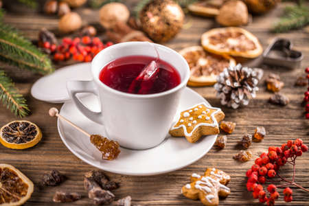 Cup of tea with Christmas cookieの写真素材