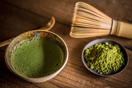 Organic green matcha tea in a bowl