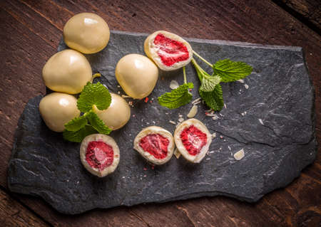 Dried strawberries in white cream chocolate