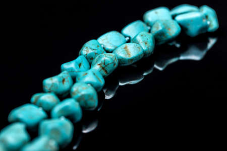 Necklace of turquoise stone, close upの写真素材