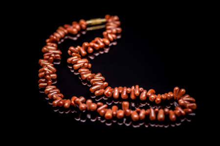 Female necklace made of sunstonesの写真素材