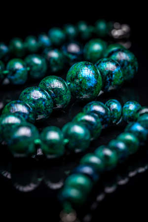 Beaded necklace on black backgroundの写真素材