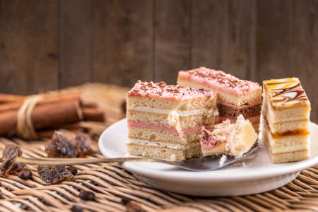 Three different pastries on white plate