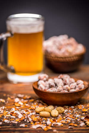 Appetizer with beer and salted peanutsの写真素材