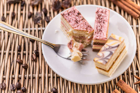 Different pastries on white plate ready to eatの写真素材