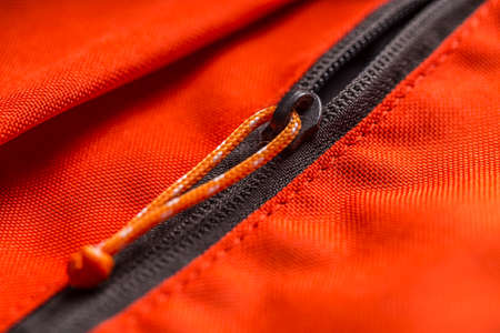 Zippered red bag pocket, close upの写真素材