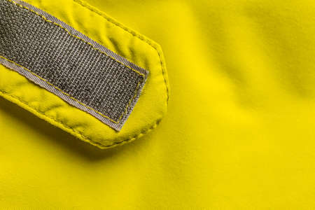 Velcro fastener on coat, copy space