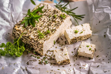 Soft  farm cheese with spices ready for eatの写真素材