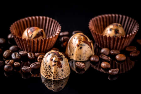Delicious chocolate pralines on black backgroundの写真素材