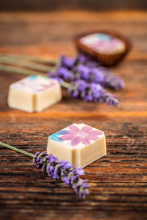 White chocolate truffles with lavender on wooden backgroundの写真素材