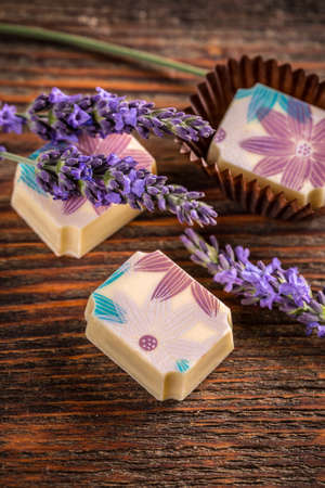 Lavender pralines on vintage wooden backgroundの写真素材