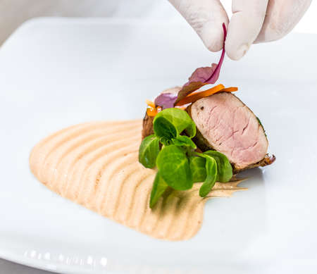 Delicious fried loin pork lunch in a fine dining restaurantの写真素材