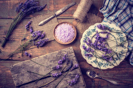 Lavender bath salt and bunch of fresh flowersの写真素材