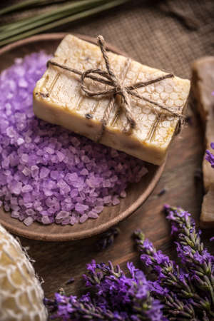 Bar of natural soap and lavender bath saltの写真素材