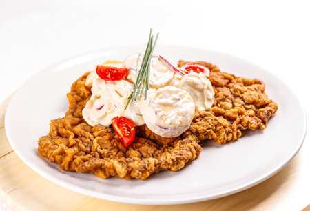 Delicious wiener schnitzel with potatoes saladの写真素材