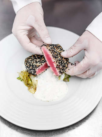 Grilled tuna steak in white and black sesame seedsの写真素材