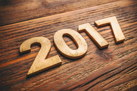 Number 2017 on old retro vintage style wooden textureの写真素材