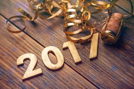 2017 year wood number on vintage wooden background