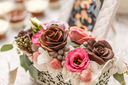 Delicious wedding reception candy bar dessert decoration with chocolate rosesの写真素材