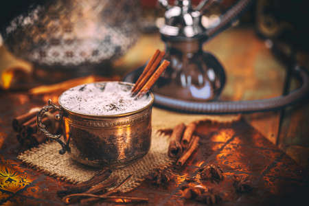 Traditional chai tea with spices and milkの写真素材