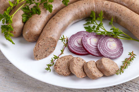 White pudding sausage served with onionの写真素材