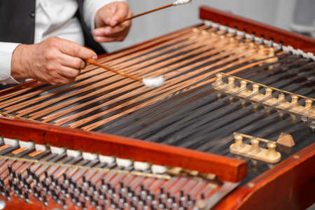 Playing the dulcimer folk musical instrumentの写真素材