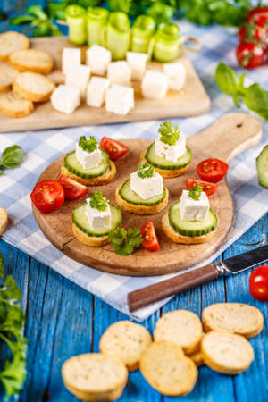  Bread rusks fine toasted with feta cheese and cucumber