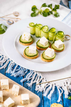 Sandwiches with feta cheese and cucumbe, Healthy finger foodの写真素材