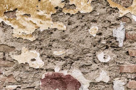 Old cracked concrete brick wall backgroundの写真素材