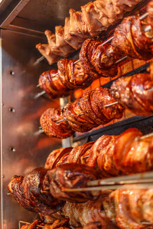 Roasted pork knuckles on the spitの写真素材