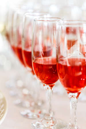 A lot of wine glasses with a cool, delicious strawberry champagneの写真素材