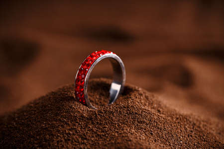 Red jewellery ring on brown backgroundの写真素材
