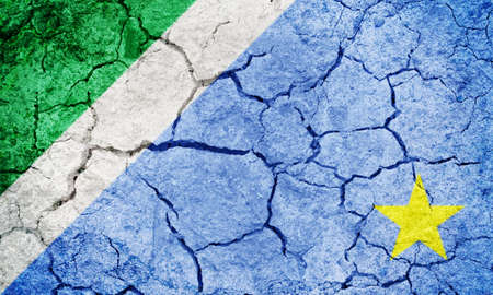 State of Mato Grosso do Sul, state of Brazil, flag on dry earth ground texture backgroundの写真素材