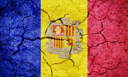 Andorra flag on dry earth ground texture backgroundの写真素材