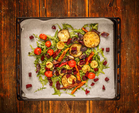 Oven roasted vegetables with the baking trayの写真素材