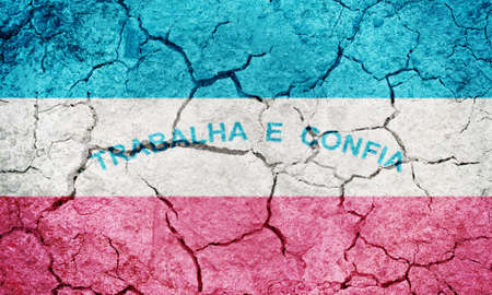 State of Espirito Santo, state of Brazil, flag on dry earth ground texture backgroundの写真素材